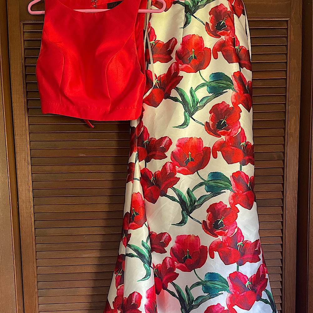 Size 2 floral and red dress. Only worn once and is in good condition.